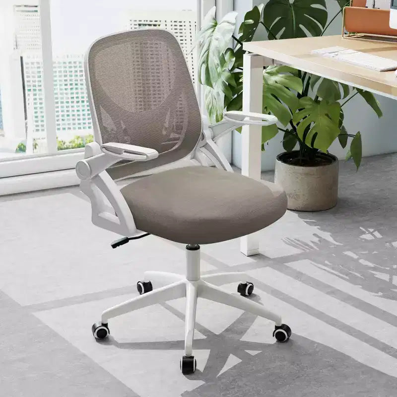 Fauteuil de bureau ergonomique en maille avec support lombaire, accoudoirs relevables et roulettes, 150 kg