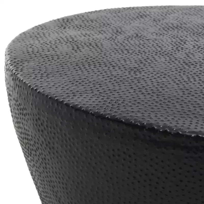 Table basse ronde en aluminium de style marocain avec texture organique, finition noire